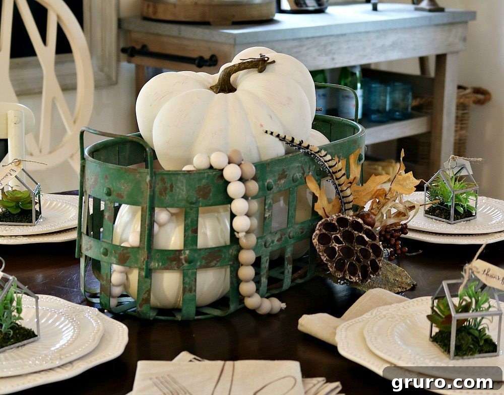 Details of a fall table setting, showcasing dish towels used as stylish napkins.