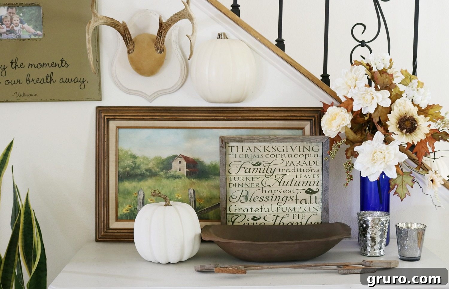 Cozy fall entry decor featuring a styled console table with seasonal accents.