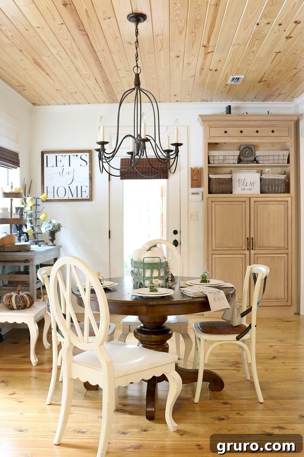 Simple fall decor ideas featuring dried gourds and other natural elements on a display.