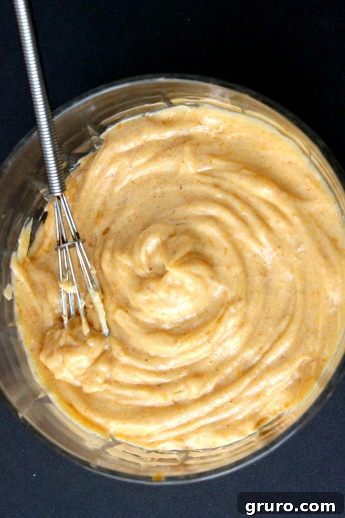 Delicious Pumpkin Spice Honey Butter spread on toast, perfect for fall breakfasts