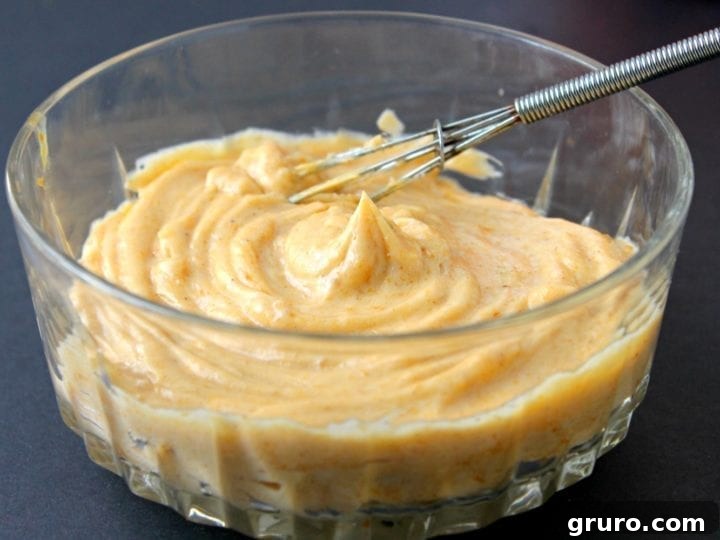 Rich and creamy Pumpkin Spice Honey Butter, ready to be served