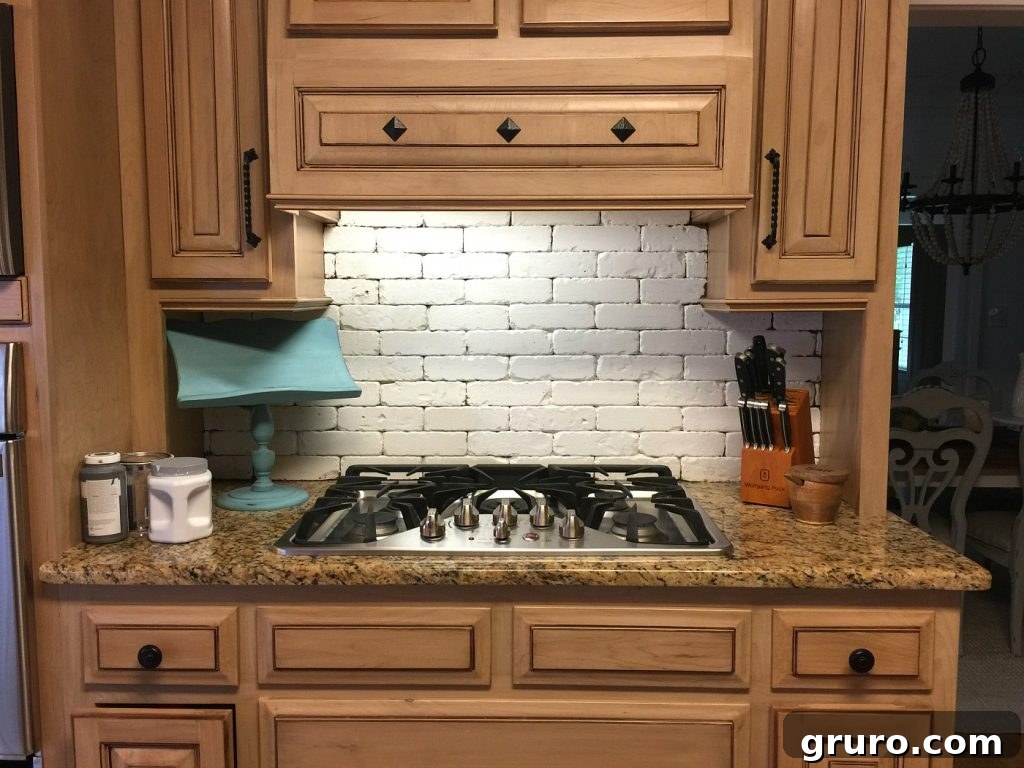 Painted brick backsplash before the distressing process