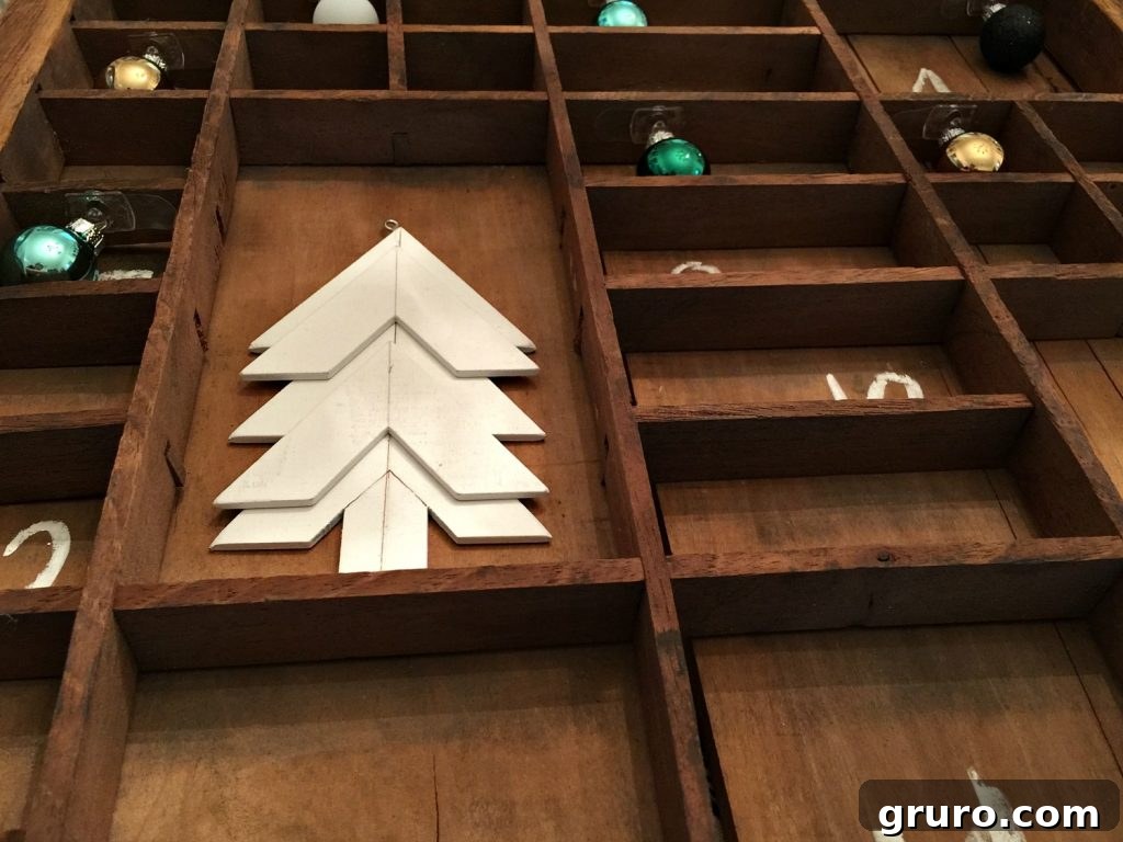 Creating a rustic farmhouse advent calendar using a printer tray, highlighting the DIY process.