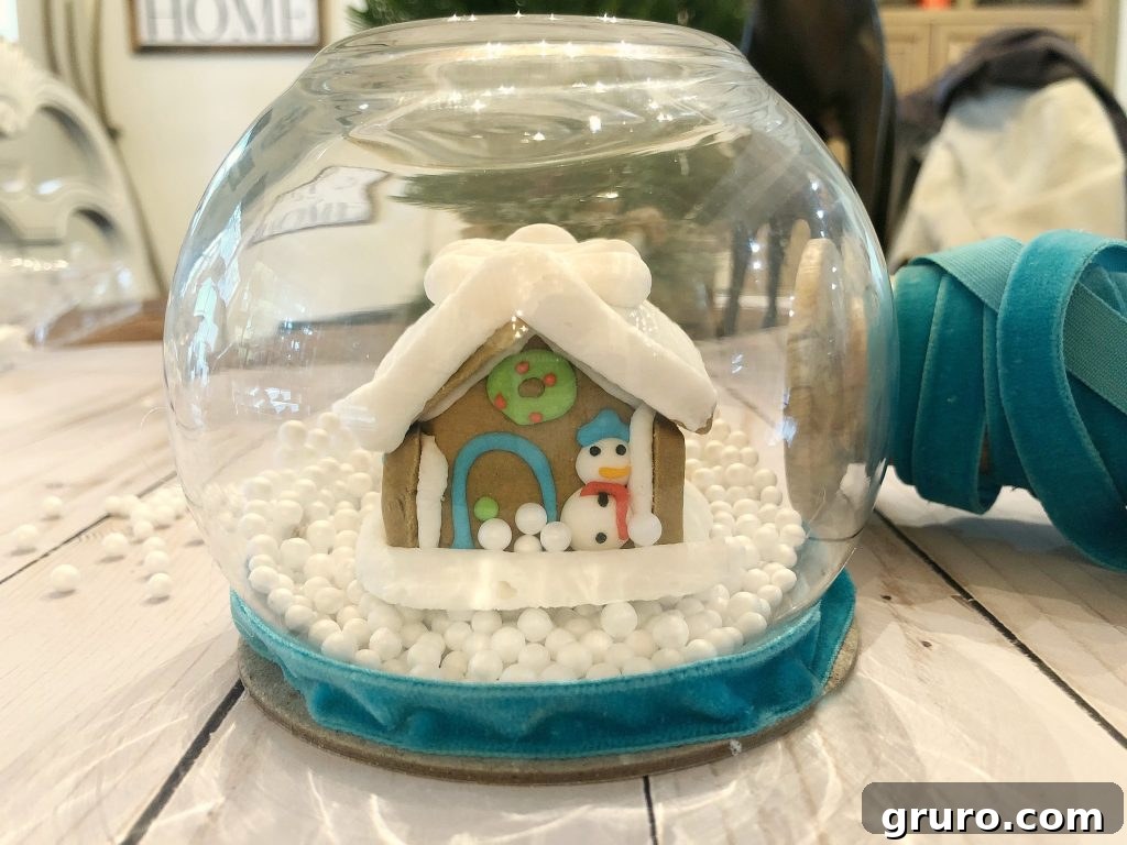 Whimsical Gingerbread Snow Globe 4 Easy to make with Dollar Store items, creating a beautiful snow globe on a budget