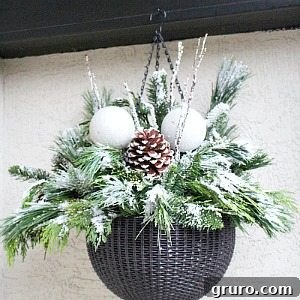 Christmas Wreath Glow-Up 13 Ideas for festive DIY Christmas planters to adorn your entryway