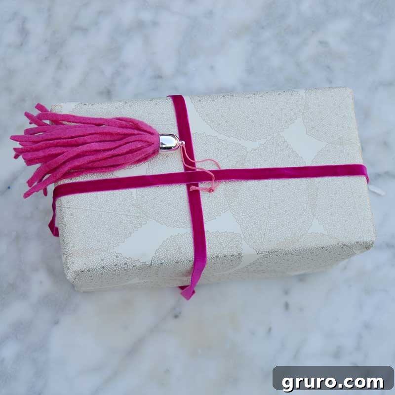 Kickstart Your Week with DIY Genius 6 DIY felt tassel present topper, a creative craft for gift wrapping or decor.