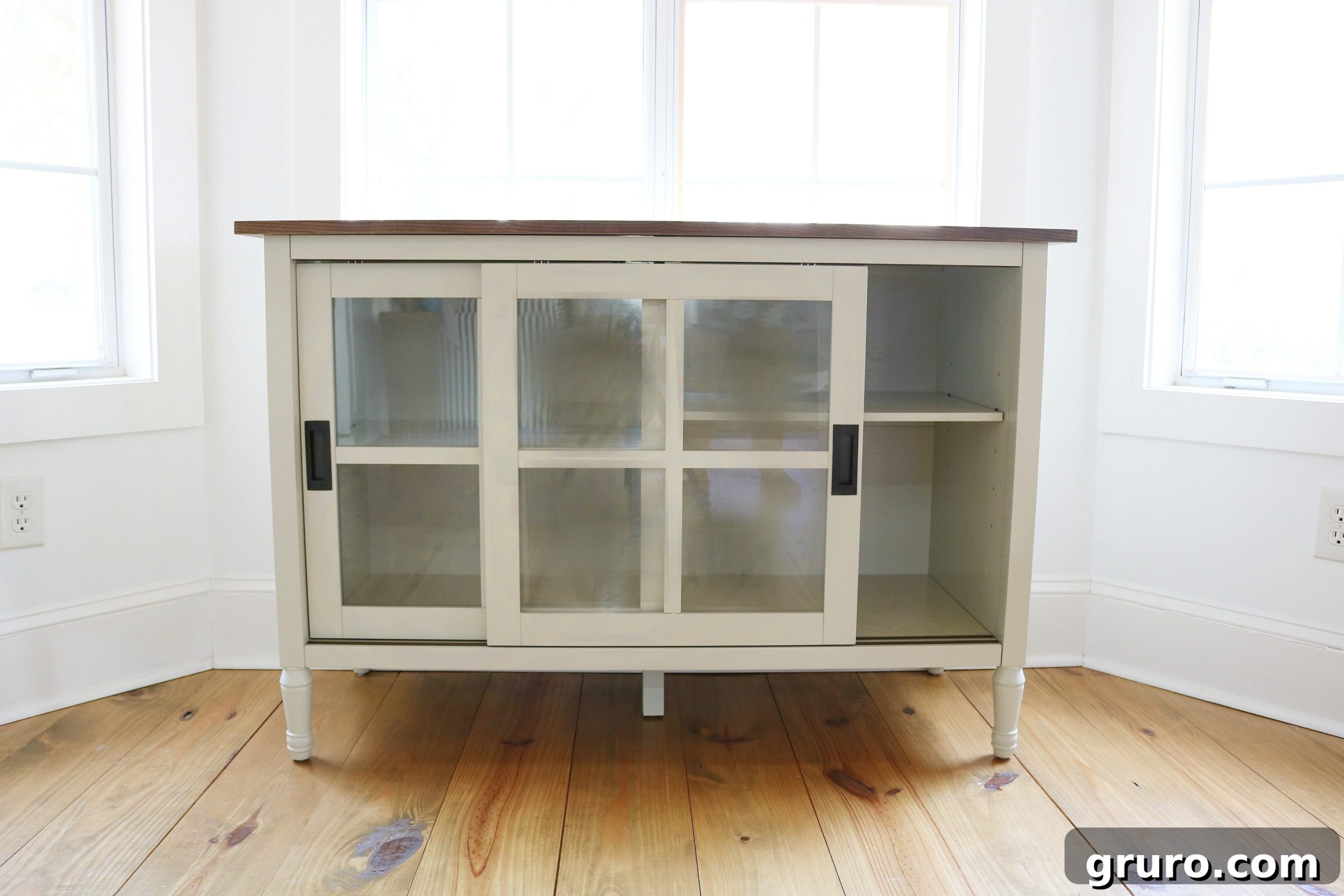 Smart Dining Room Storage 3 Storage buffet with elegant sliding glass doors in a dining room