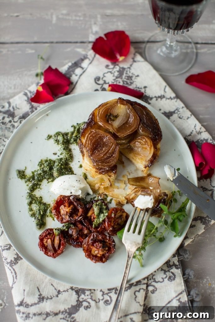 Shallot tarte tatin with goat’s cheese, roasted cherry tomatoes, and watercress salsa verde recipe, perfect for gourmet comfort