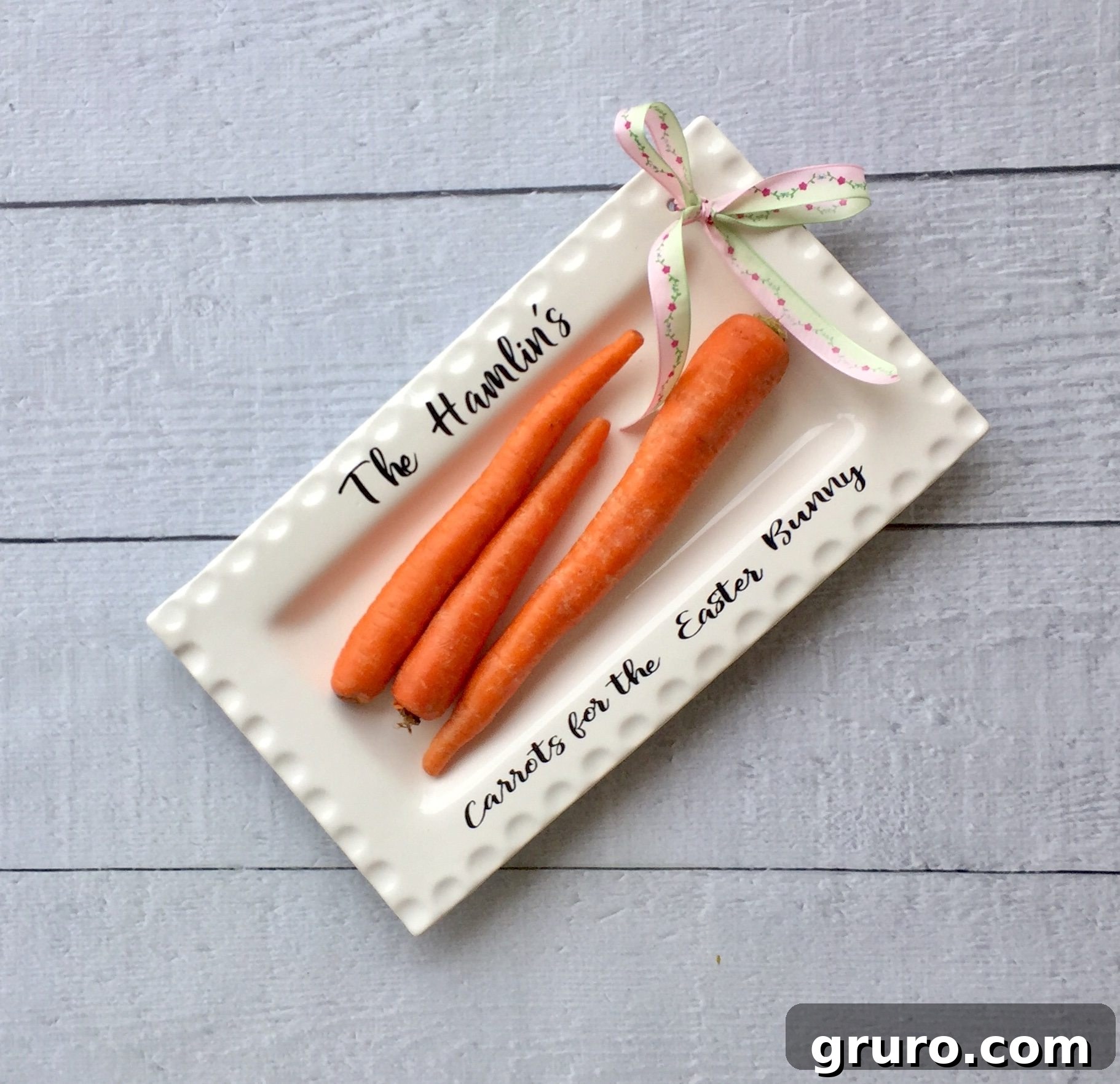 Personalized ribbon platter for Easter with a bunny design and 'Carrots for the Easter Bunny' text, decorated with a checked ribbon.