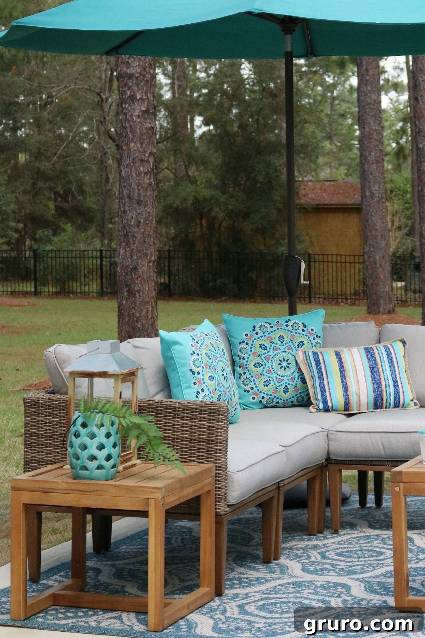 Corner patio sofa providing cozy and intimate seating.