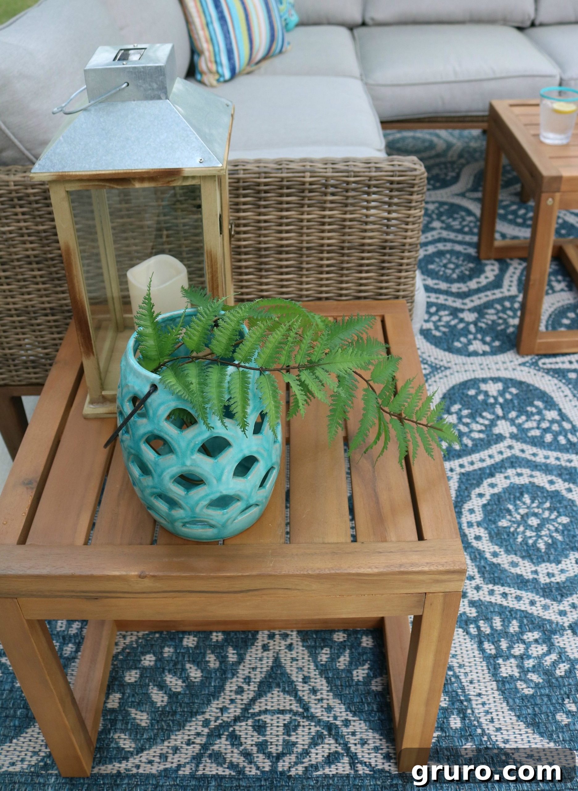 Elegant wood side table, part of the outdoor sectional set.