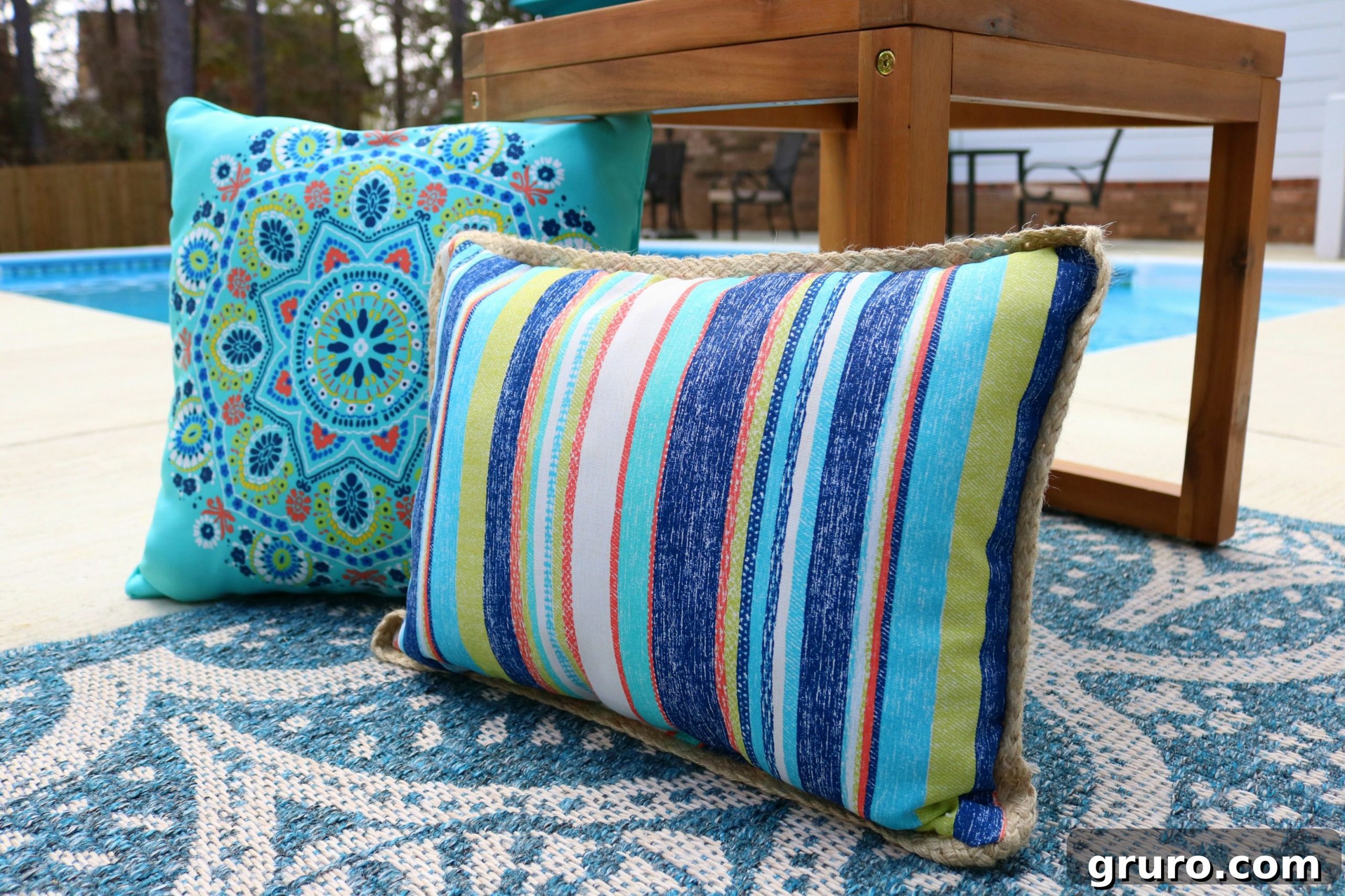 Mix and match outdoor pillows with vibrant patterns and textures.