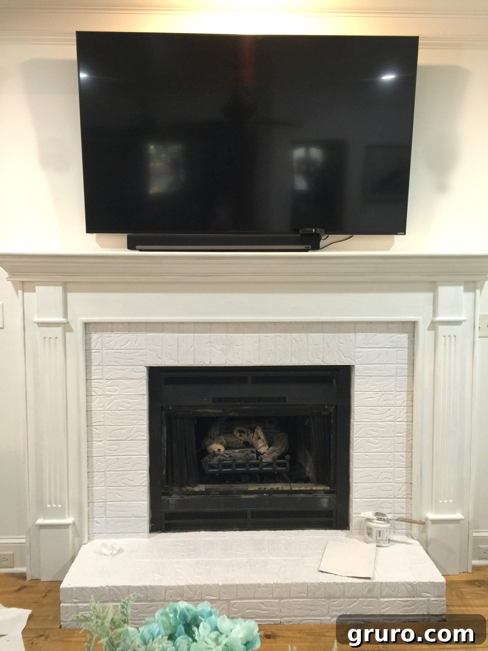 Final Coat of Paint on Refinished Fireplace and Hearth Trim