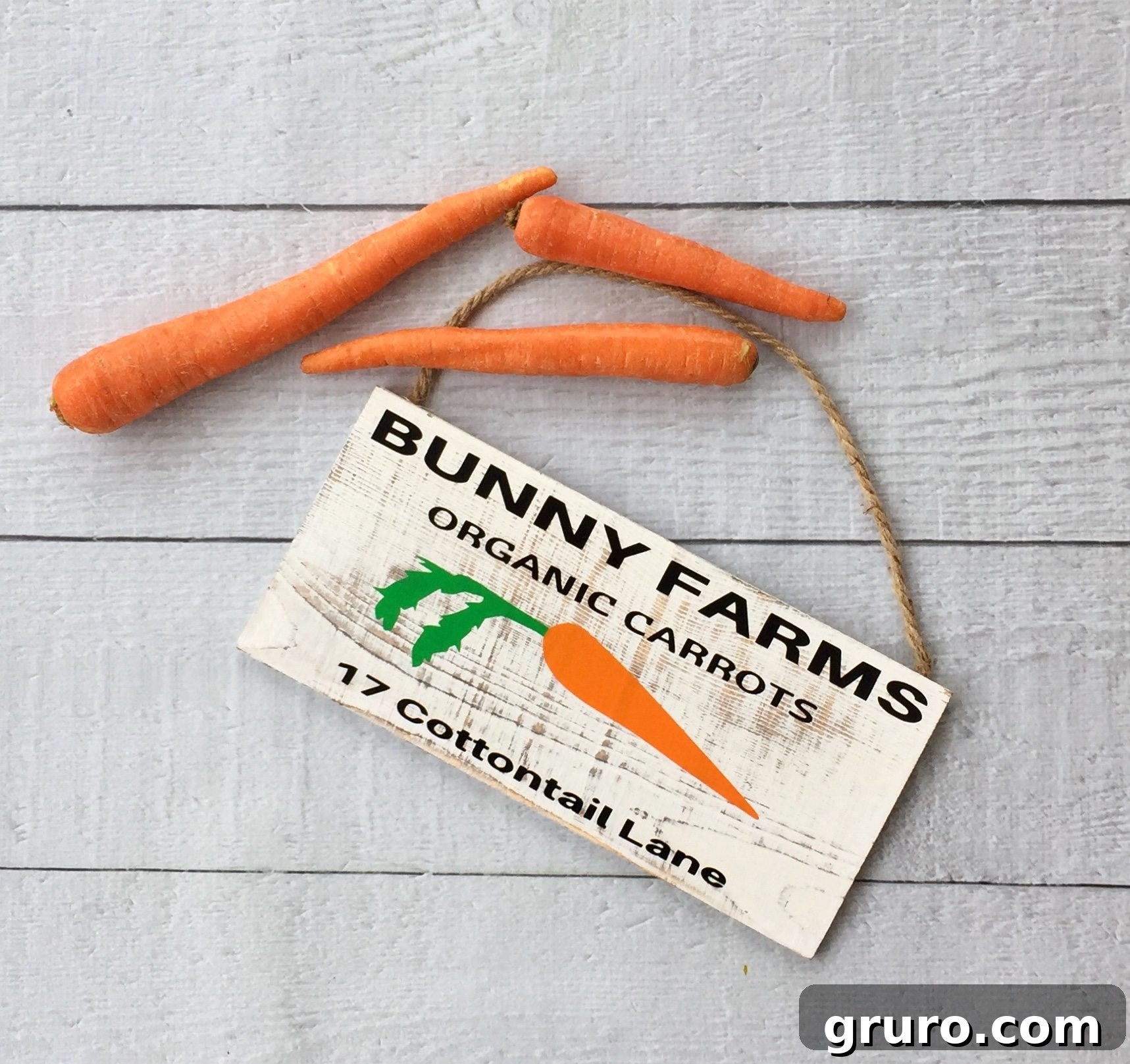 Finished rustic wood bunny sign displayed for Easter