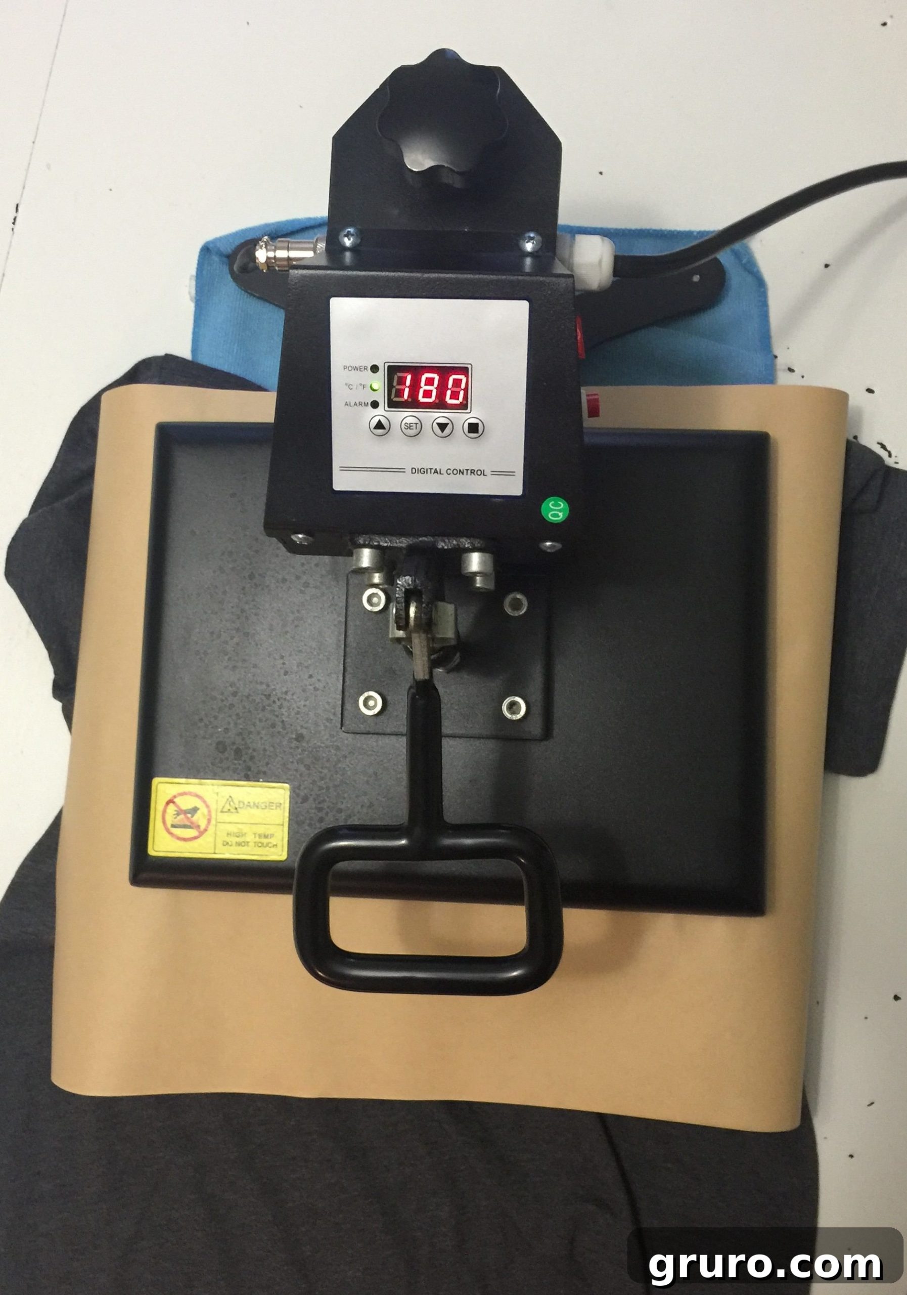 Close-up of the heat pressing process on the custom t-shirt