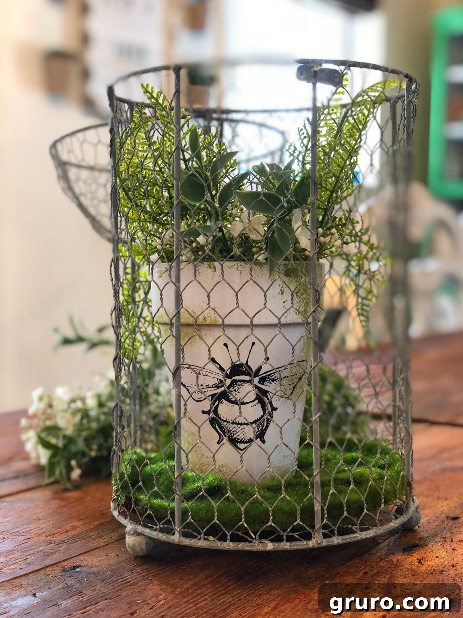 Completed Rustic Clay Pot DIY with Moss and Bee Design Rustic Clay Pot DIY with Bee and Moss Elements