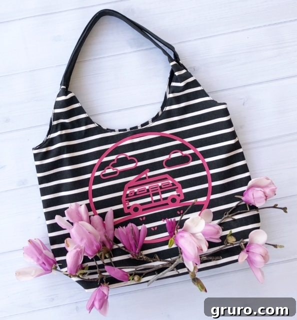Customized spring overnight bag with a charming camper design made using Cricut vinyl