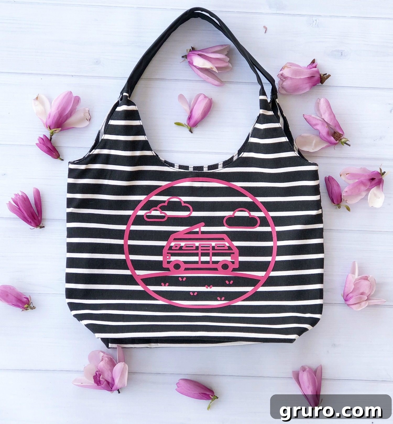Detailed view of the customized spring overnight bag with its charming Cricut vinyl camper design