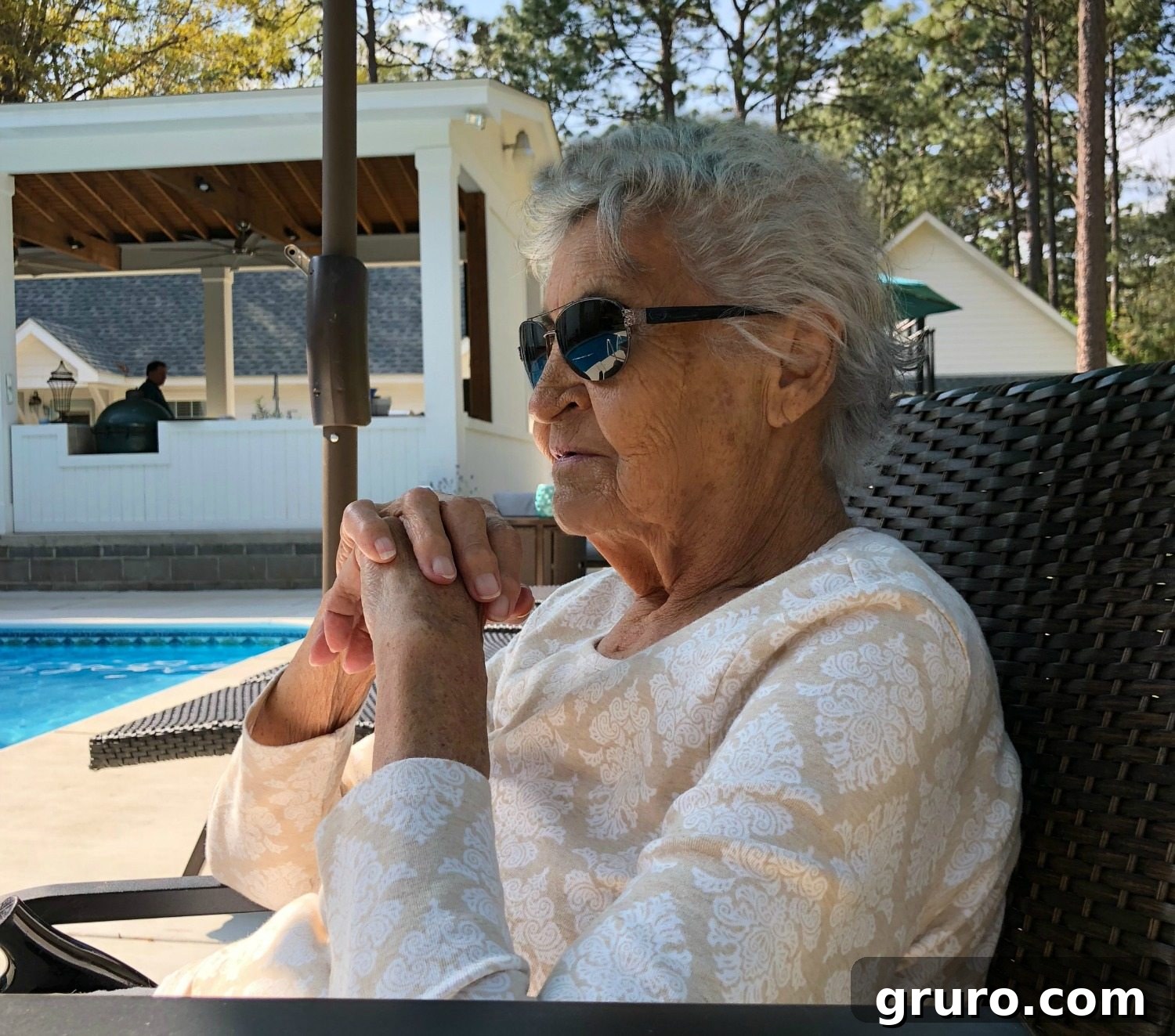 Mama, a beloved pet, enjoying the newly transformed outdoor living space, symbolizing comfort and home.