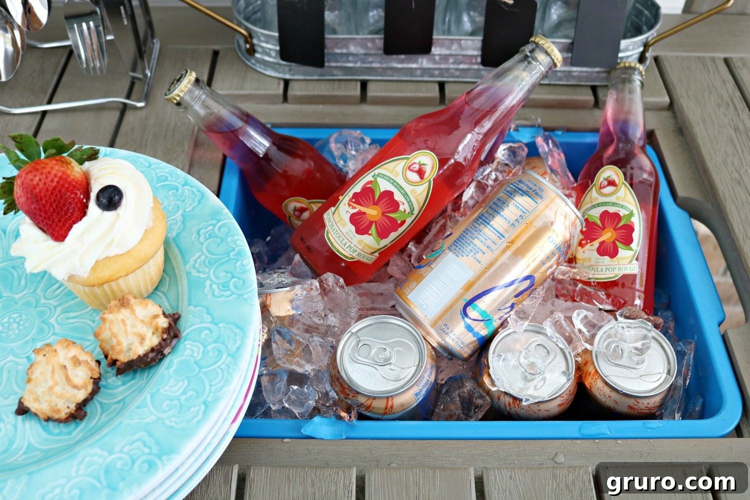 Refreshing iced drinks displayed on the potting bench, ready for guests to enjoy.