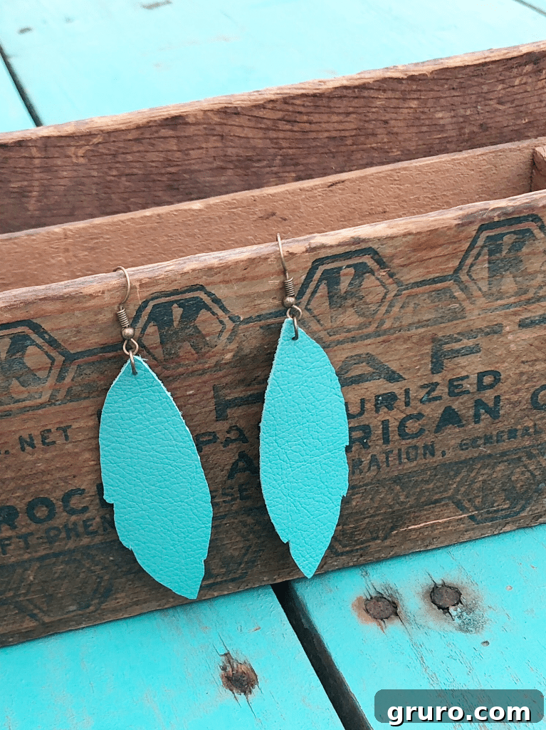 How to Make Leather Feather Earrings with Cricut: A Quick and Easy DIY Tutorial Stunning turquoise leather earrings created with a Cricut, showcasing an easy DIY project.