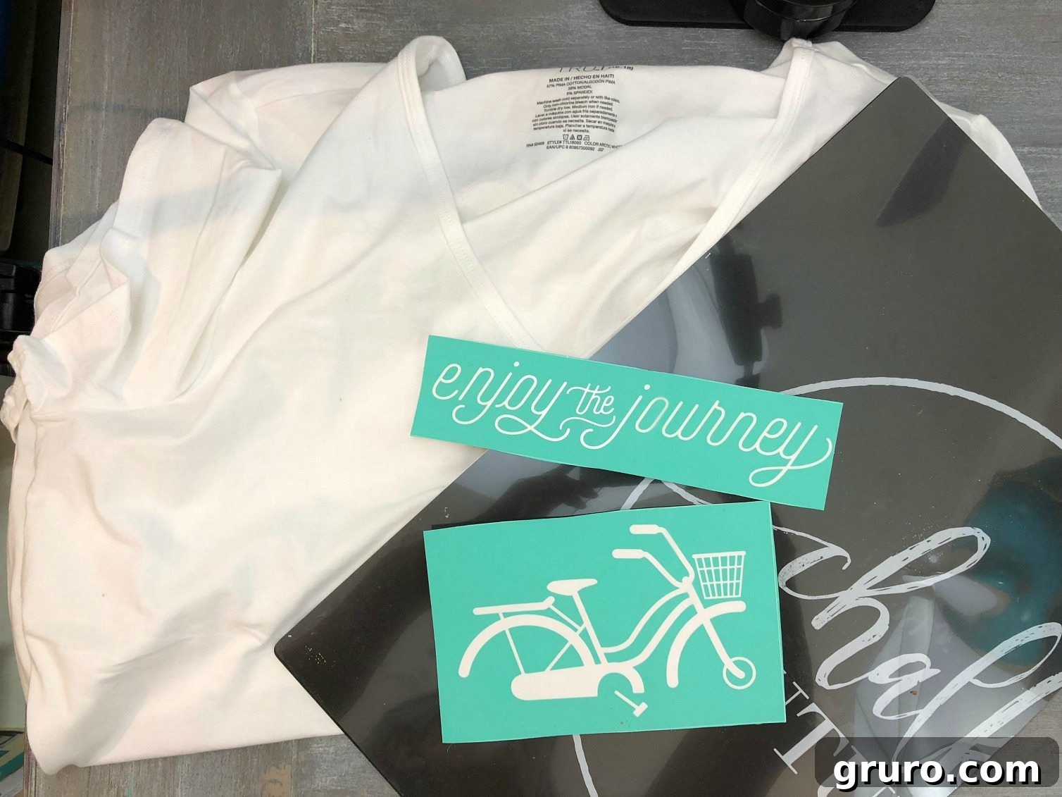 DIY Steps and Supplies for Chalk Couture Ink with Silk Screen Transfer - at home t-shirt making Applying ink with a squeegee onto a silk screen transfer for t-shirt printing
