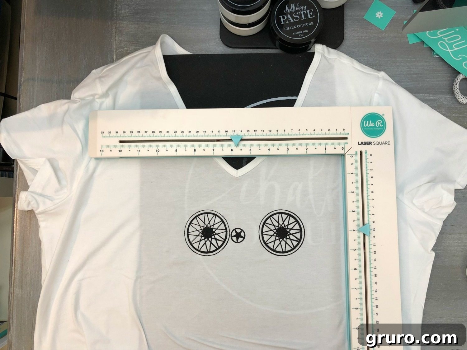 DIY Steps and Supplies for Chalk Couture Ink with Silk Screen Transfer - at home t-shirt making Using a laser square mat to perfectly align a silk screen transfer on a t-shirt