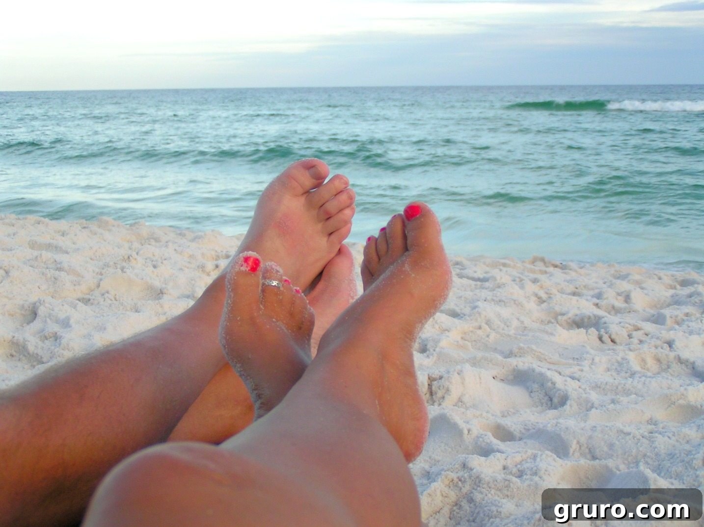 A panoramic view of Destin's serene coastline with clear emerald waters