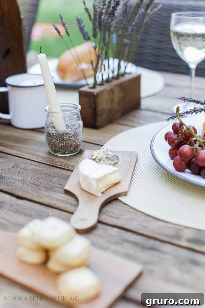 Lavender themed outdoor summer table setting with fresh flowers and rustic details