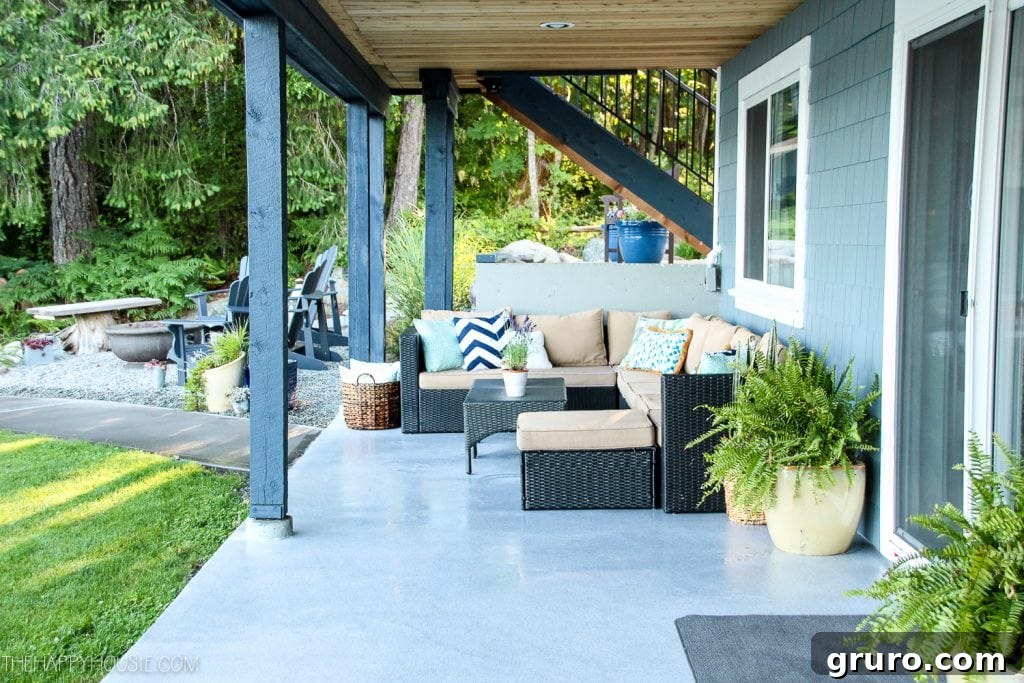 Lakefront summer patio with comfortable seating and a cozy fire pit