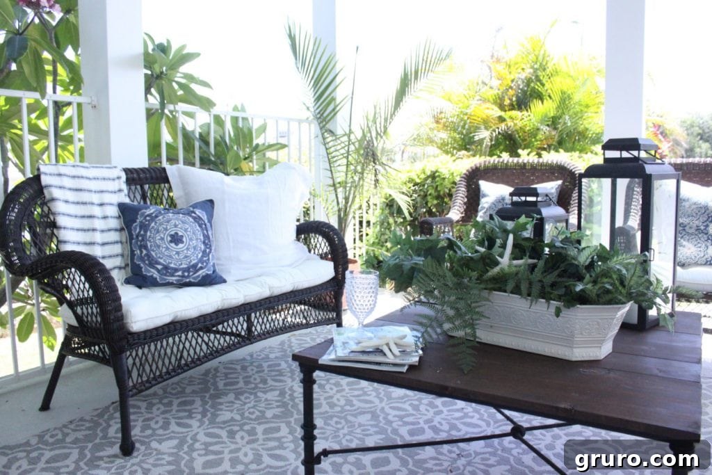 Blue and white beachy boho porch with coastal decor and bohemian accents