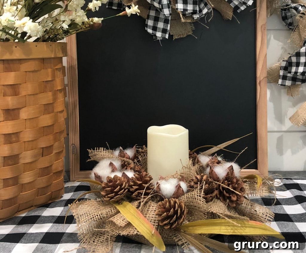Farmhouse decor from the dollar store: a close-up view of a completed burlap and cotton candle ring, meticulously showcasing its rustic textures and handmade charm