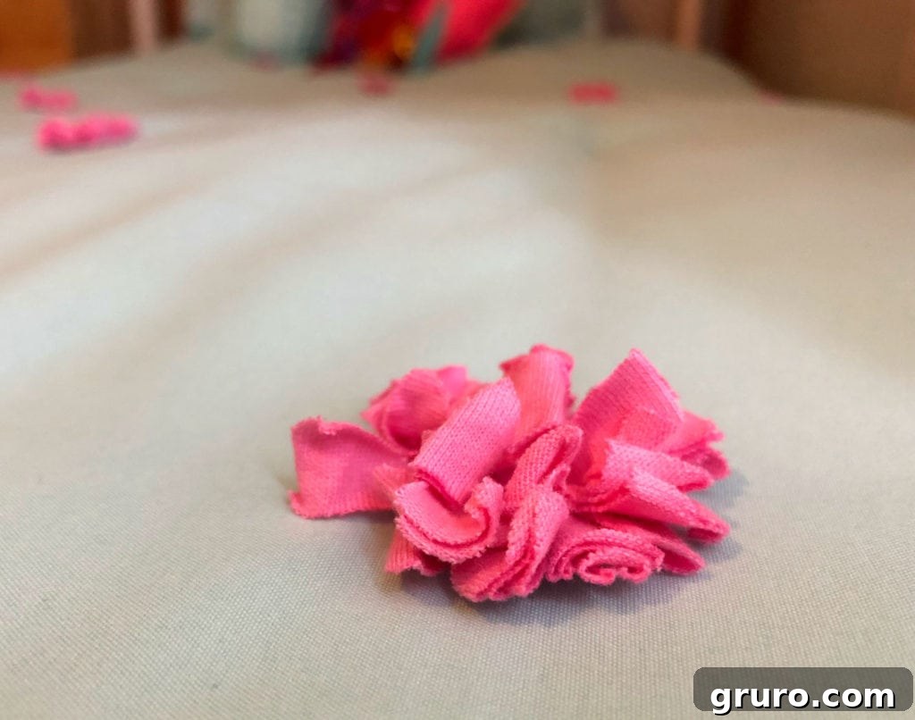 Blue and pink bedding with cute pompoms. Blue and pink bedding with cute pompoms