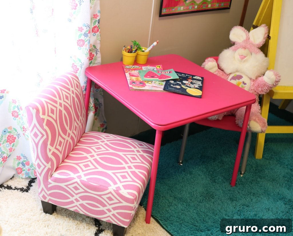 Slipper chair for kids play area. Play area in bedroom with slipper chair