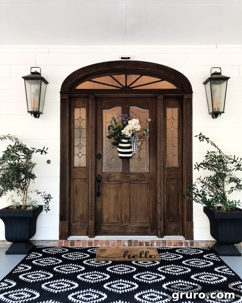 Easy DIY: Black and White Basket for Stunning Door Decor Black and white door decor ideas featuring a repurposed basket