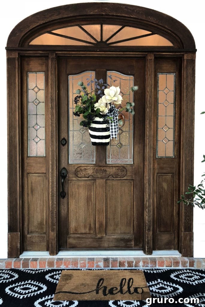 Make This Door Decor: Easy DIY from a Thrift Store Basket DIY Black and white striped door decor from a thrift store find
