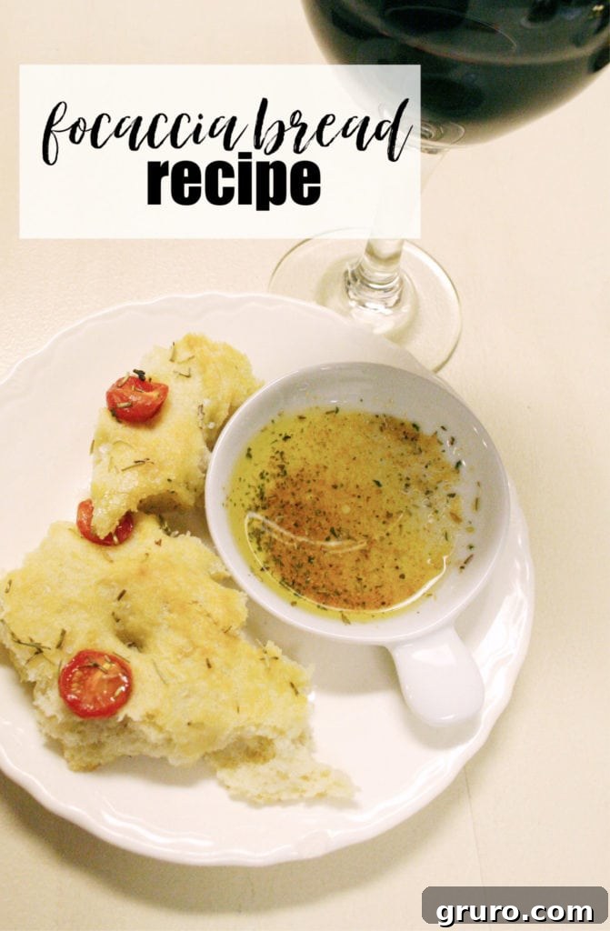 Focaccia bread served on a wooden board, ready to be enjoyed