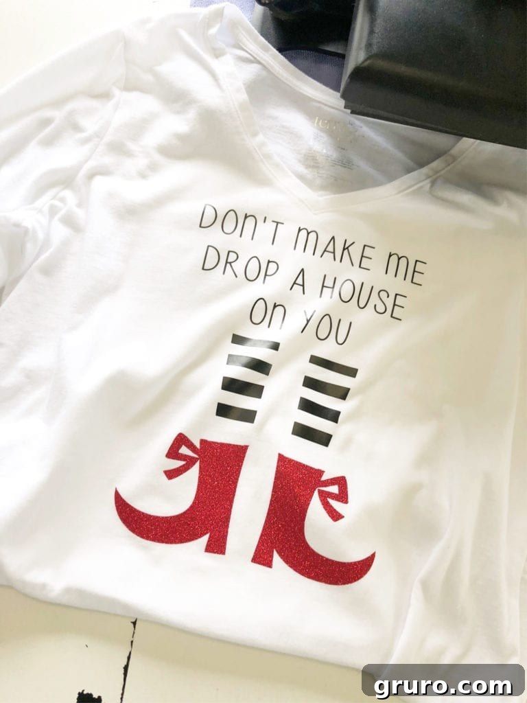 DIY Halloween T-Shirt Vinyl Idea Custom Halloween T-shirt with witch legs design created using heat transfer vinyl and Cricut