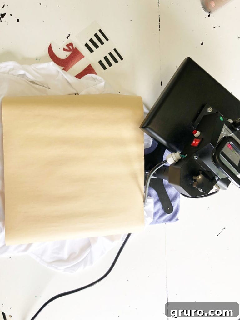Set up for Halloween T-Shirt Vinyl Idea Heat press machine set up for applying heat transfer vinyl to a Halloween T-shirt