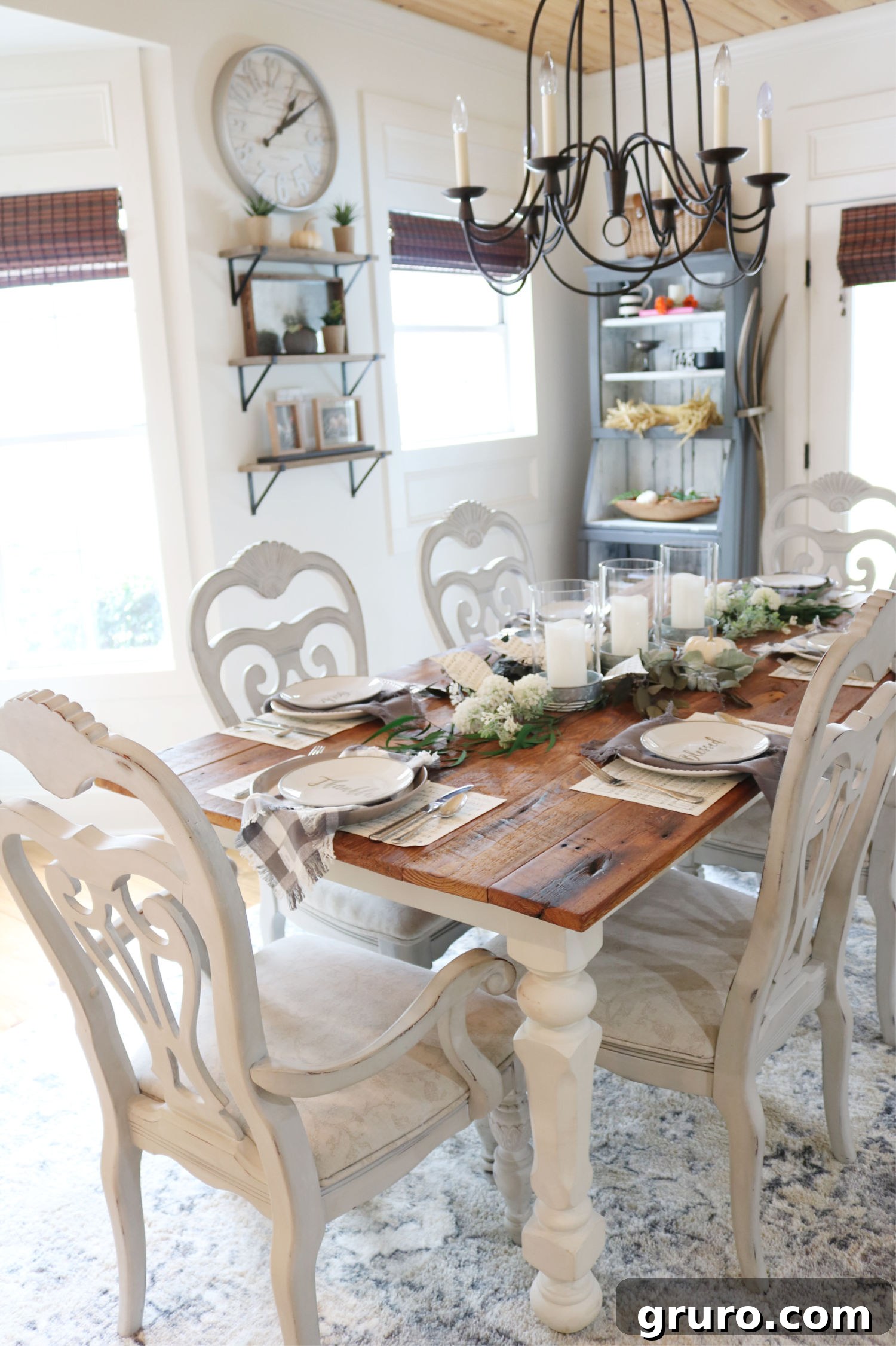 Rustic barn wood dining table styled for fall Fall barn wood table decorated with seasonal accents for a cozy dining room