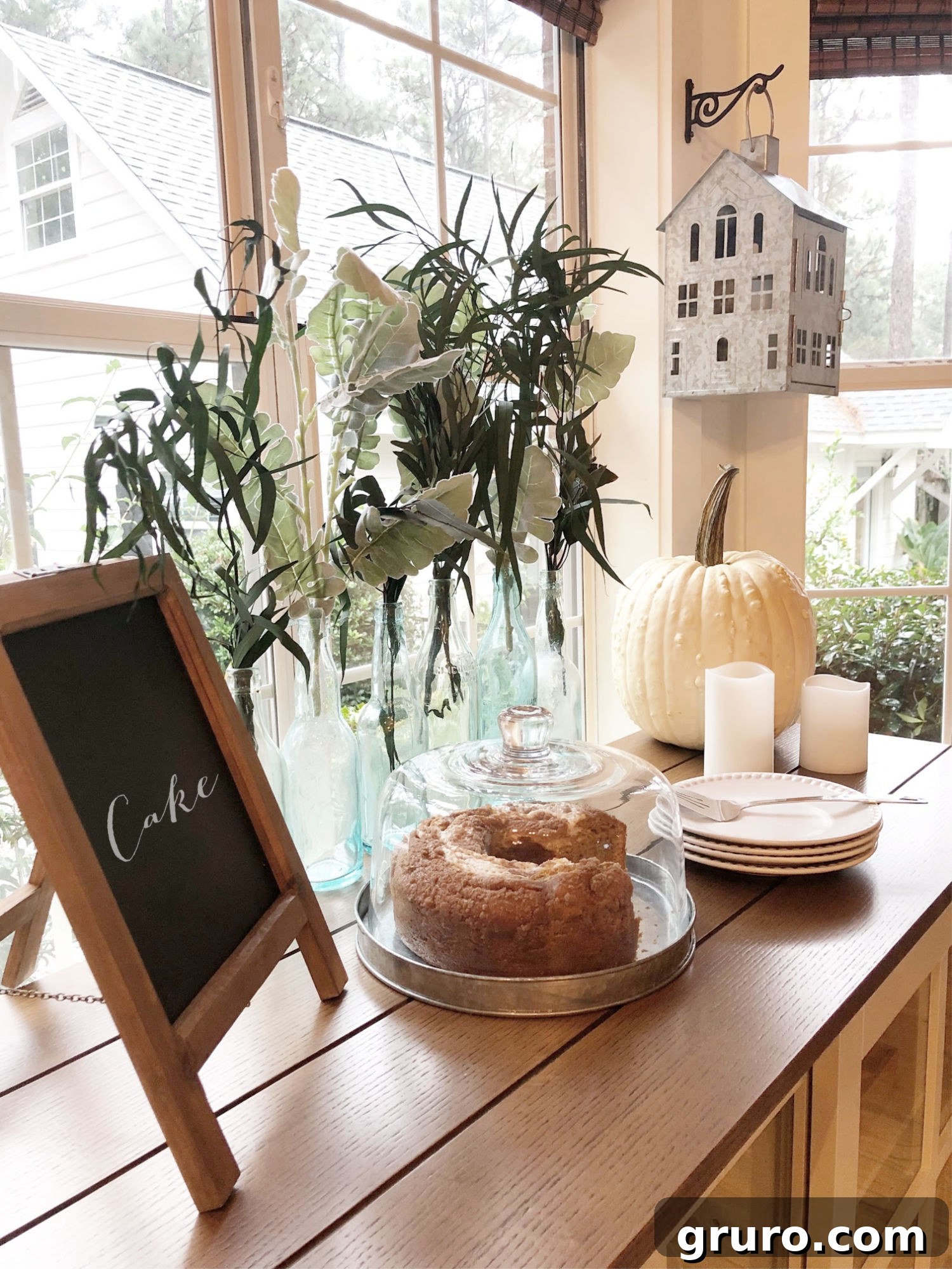 Rustic farmhouse dining room buffet area with charming accents Farmhouse buffet area in the dining room, styled with rustic lanterns and decor