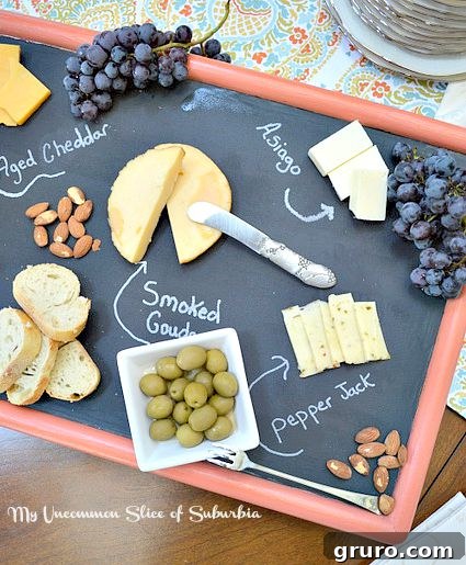 100+ Thrift Store Makeovers - creative ideas galore DIY Chalkboard Cheeseboard - An old TV tray cleverly repurposed into a stylish and functional serving board for entertaining.