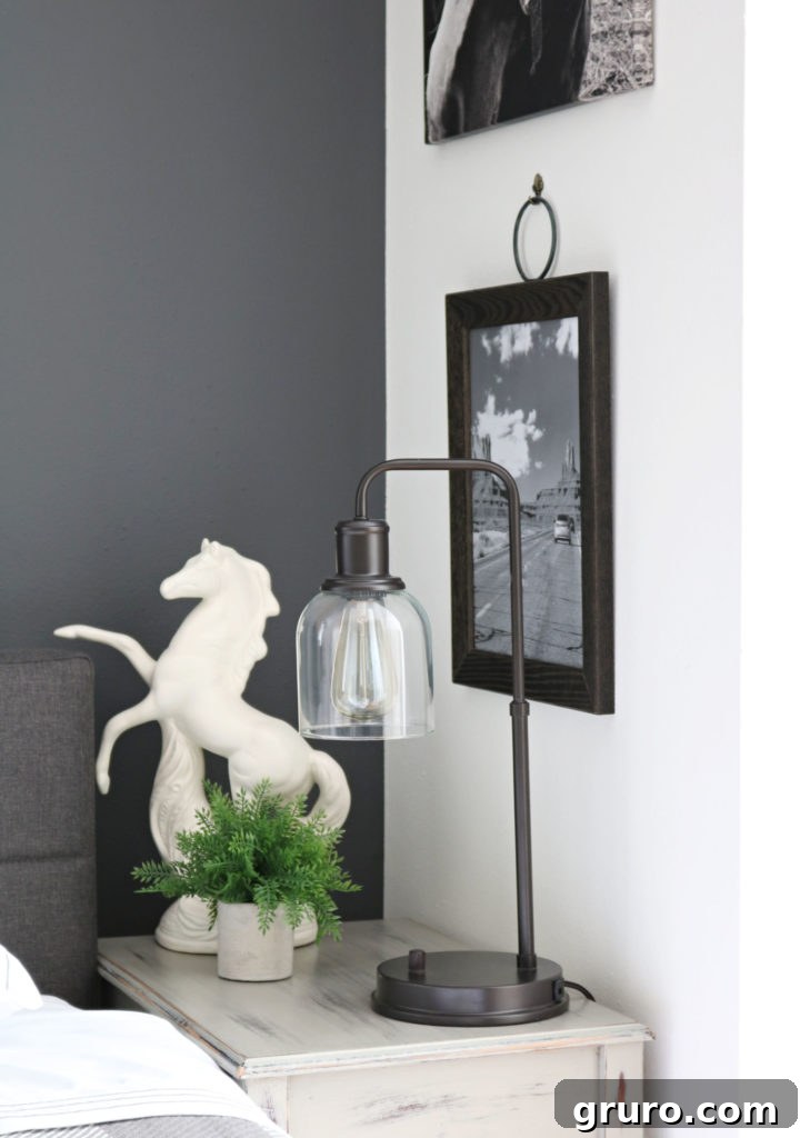 Modern Farmhouse Bedroom Makeover: Nightstand styling Framed art and a stylish BHG lamp in the Modern Farmhouse Bedroom Makeover