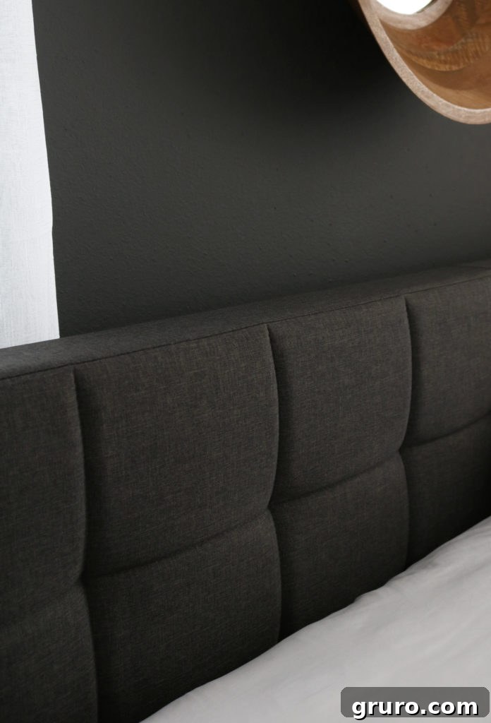 Modern Farmhouse Bedroom Makeover: King headboard detail Close-up of the BHG Gray King Headboard, central to the Modern Farmhouse Bedroom Makeover