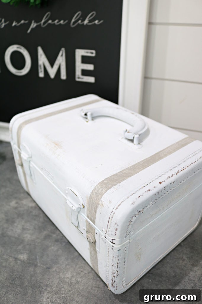 Vintage Train Case Makeover Shabby painted train case, showcasing distressed details and fresh paint