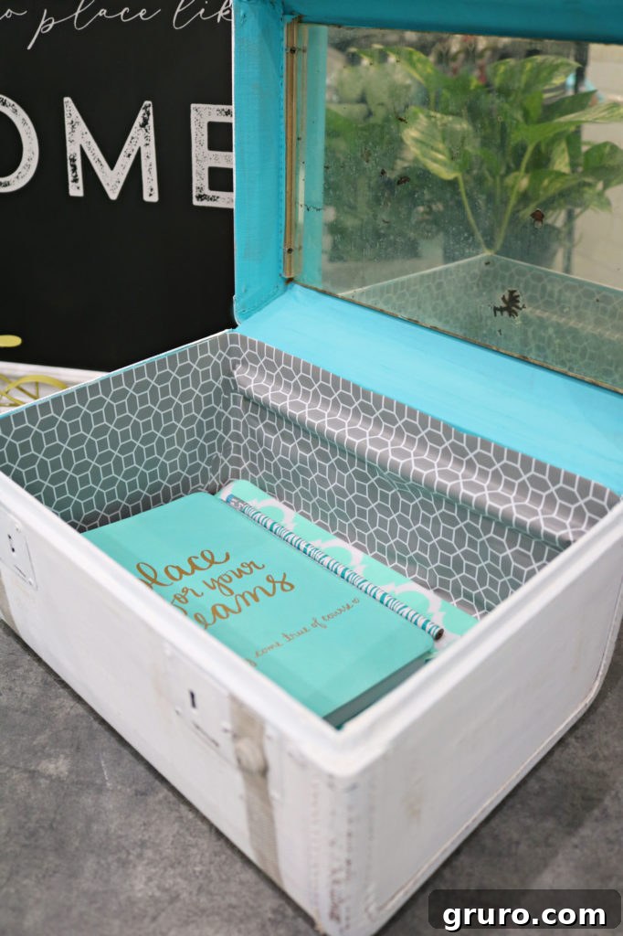 Vintage Train Case Makeover Vintage suitcase storage idea, showing the versatile interior of the repurposed case