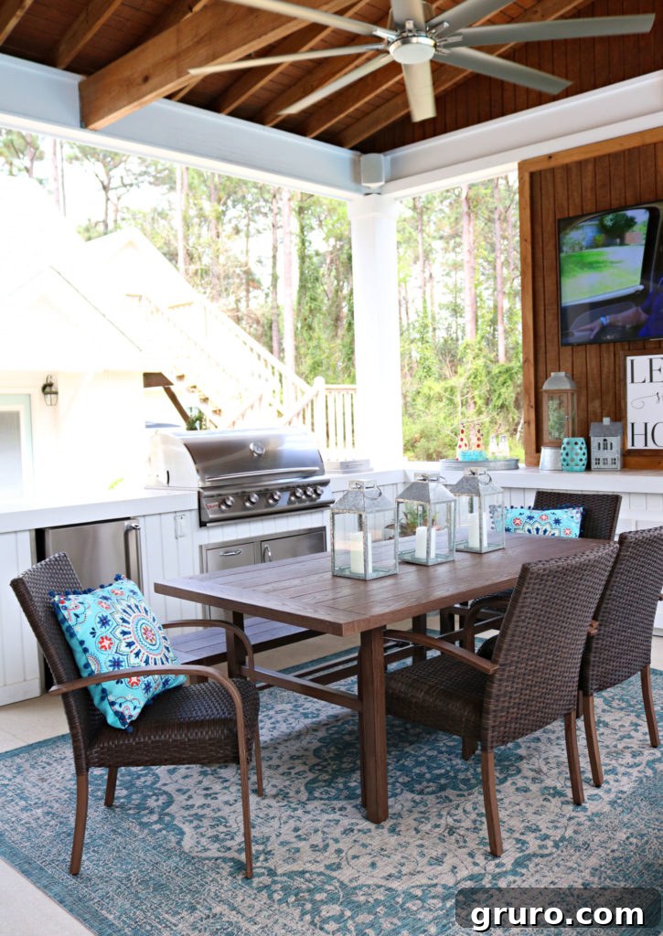 dining space on porch with decorative lanterns