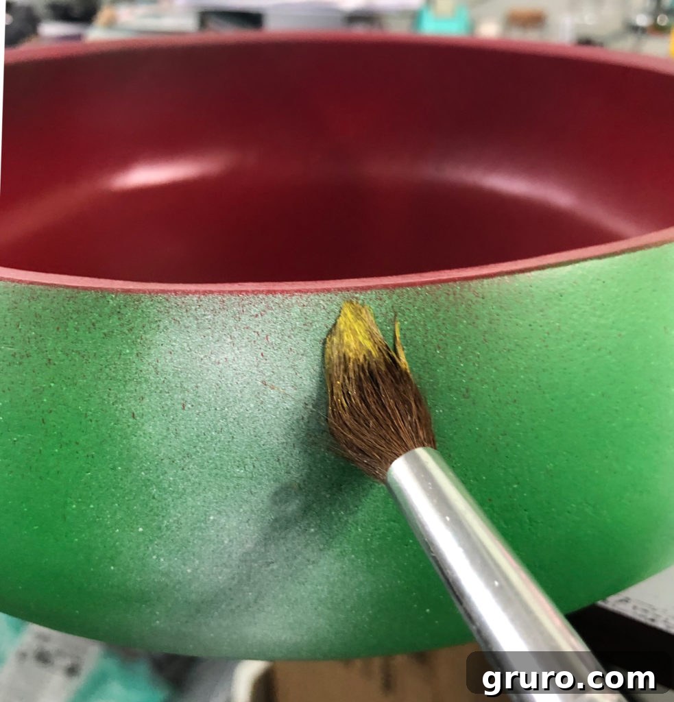 Adding white stripes to the green exterior of the watermelon bowl