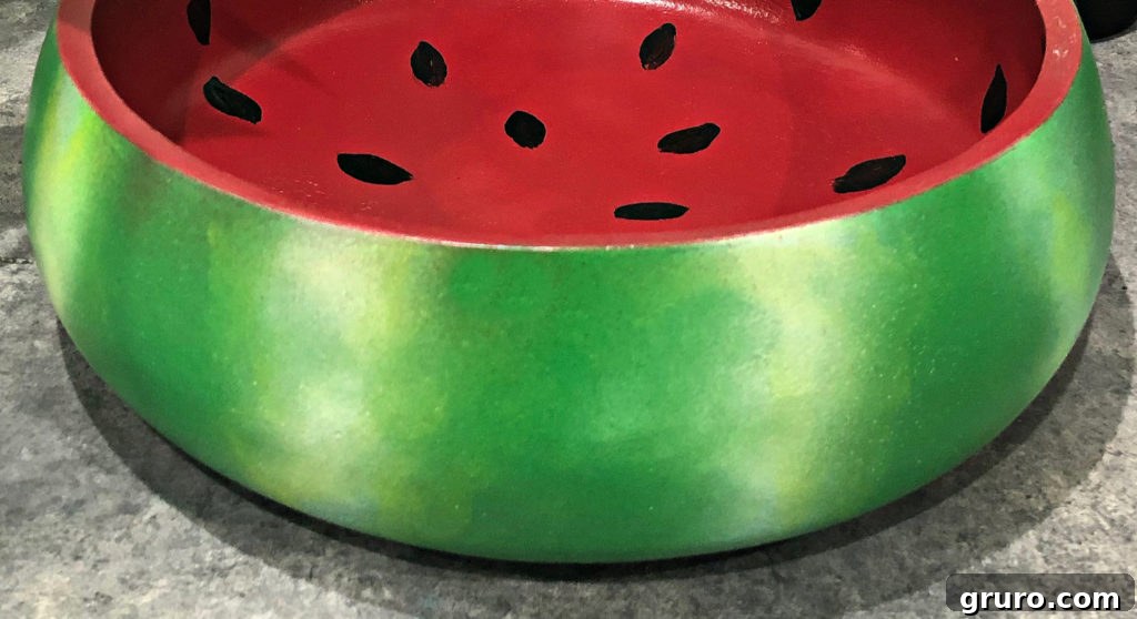 Painted watermelon wood bowl with detailed seeds
