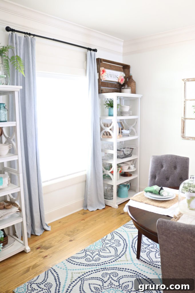 Curated Dining Room Shelving 6 dining room with open storage, showcasing beautifully styled shelves with mixed decor.